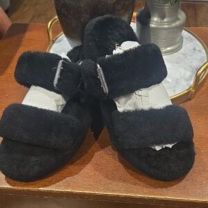 UGG Women's Oh Yeah slippers, which feature a strappy silhouette.